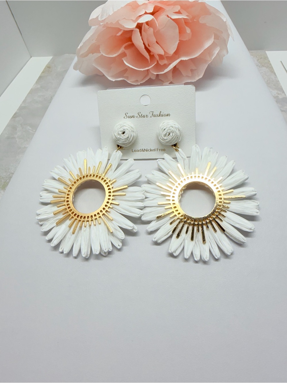 White Floral Sunburst Drop Earrings with Gold Accents